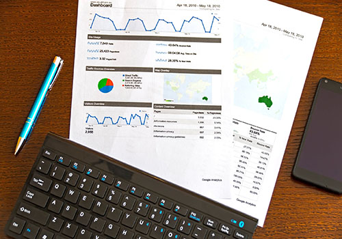 Paper with Google Analytics on a desk