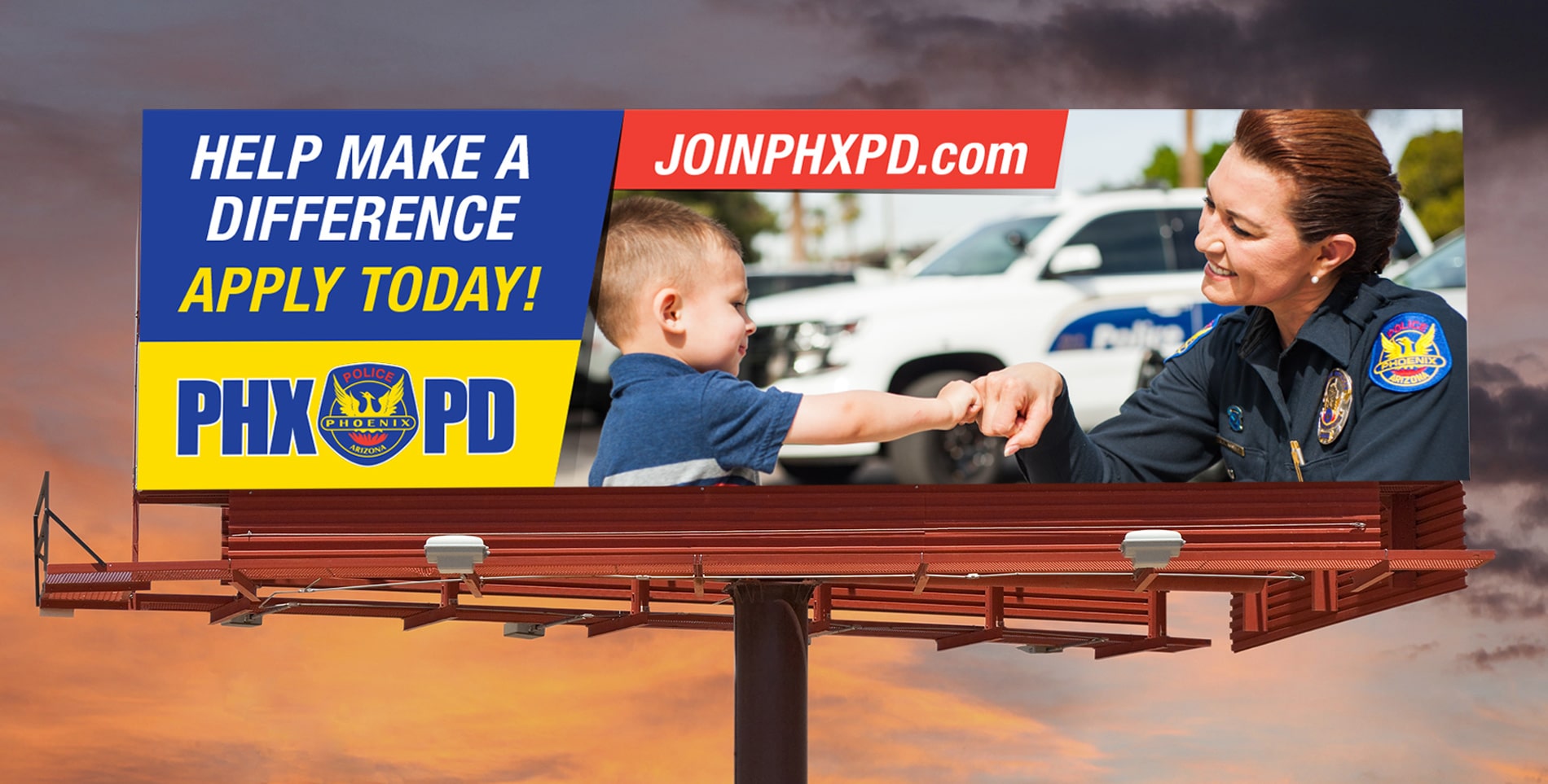 A Billboard ad for Phoenix Police Department "Help make a difference. Apply Today!"