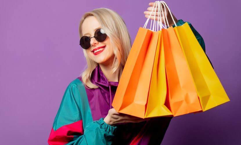 Woman in retro clothing with shopping bags